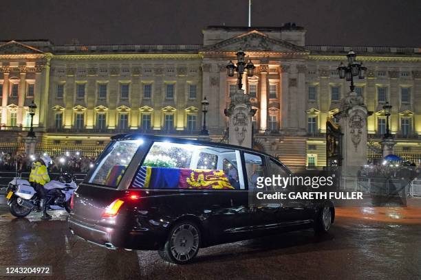 The coffin of Queen Elizabeth II arrives in the Royal Hearse at Buckingham Palace in London on September 13 where it will rest in the Palace's Bow...