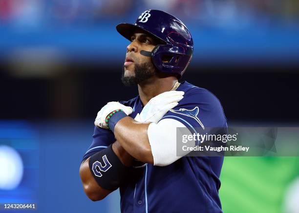 Yandy Diaz of the Tampa Bay Rays celebrates after hitting a single in the seventh inning during game one of a doubleheader against the Toronto Blue...