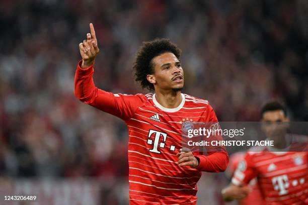 Bayern Munich's German midfielder Leroy Sane celebrates scoring the 2-0 goal during the UEFA Champions League Group C football match between FC...