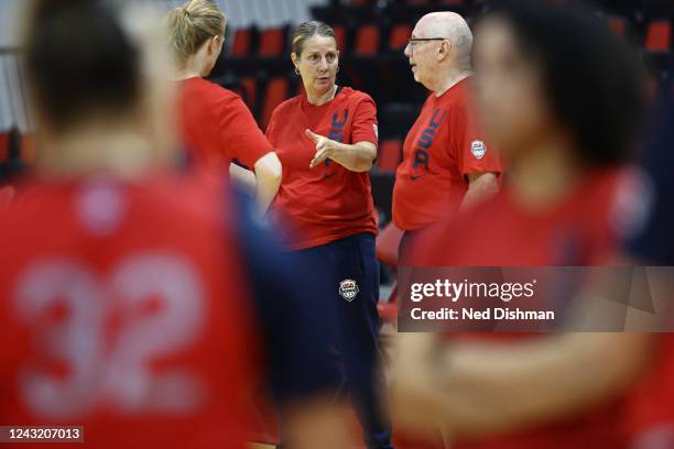 Cheryl Reeve head coach of the USA Womens Basketball Team talks with assistant coaches Mike Thibault and Katie Smith during practice on September 9,...