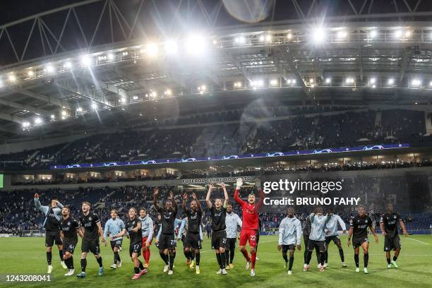 Club's players celebrate after winning the match between Belgian soccer team Club Brugge KV and Portuguese FC Porto, Tuesday 13 September 2022 in...