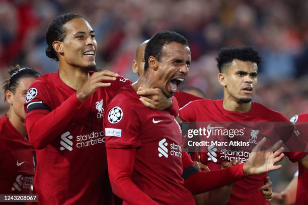 Joel Matip of Liverpool celebrates scoring his goal with Virgil van Dijk, Luis Diaz and Mohamed Salah during the UEFA Champions League group A match...