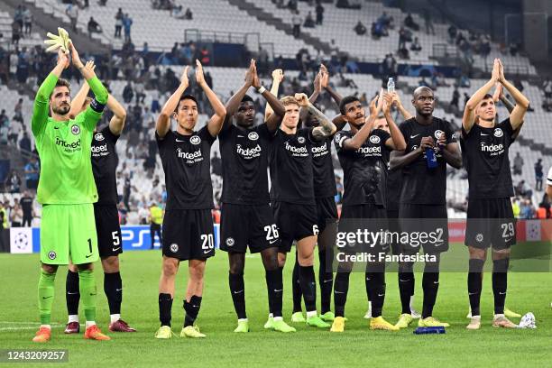 The Team of Eintracht Frankfurt celebrates the win after the UEFA Champions League Group D match between Olympique de Marseille and Eintracht...