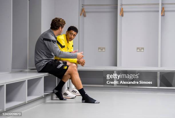 Jude Bellingham and head coach Edin Terzic prior to the Borussia Dortmund Training Session at the Etihad Stadium on September 13, 2022 in Manchester,...