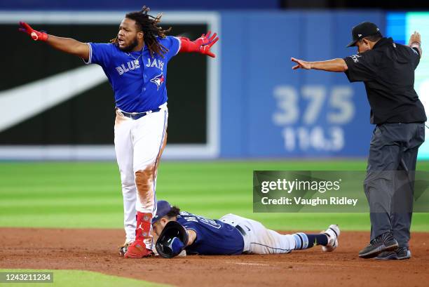 Vladimir Guerrero Jr. #27 of the Toronto Blue Jays reacts after hitting a double in the sixth inning during game two of a doubleheader against the...