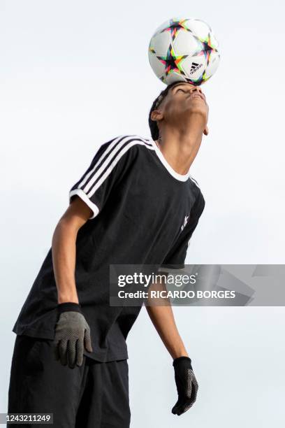 Brazilian digital influencer Iran Ferreira, known as "Luva de Pedreiro," poses for a picture in Rio de Janeiro, Brazil, on September 11, 2022. - Luva...