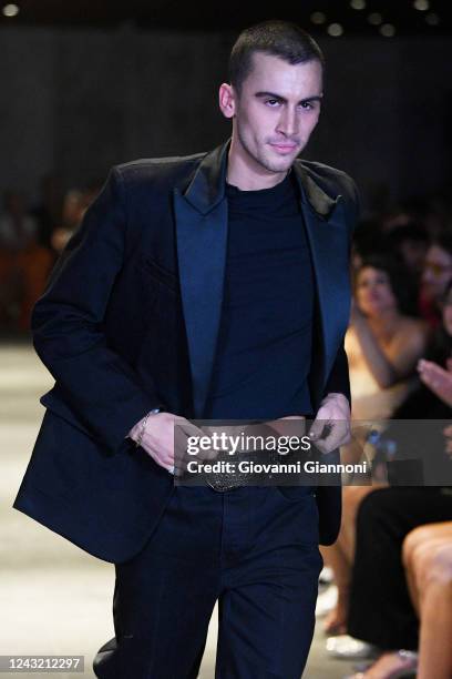 Designer Christian Cowan walks the runway at Christian Cowan Spring 2023 fashion show on September 13, 2022 in New York, New York.