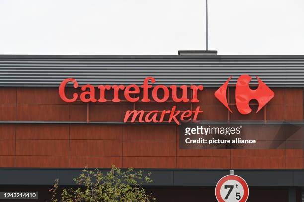 September 2022, Belgium, Eupen: Logo, lettering of Carrefour market , french retail and wholesale company Photo: Horst Galuschka/dpa/Horst Galuschka...
