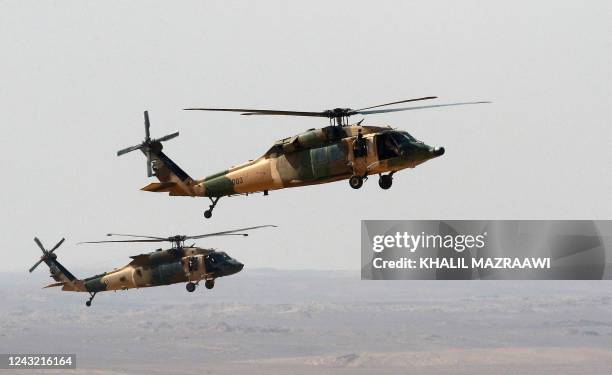 Black Hawk Jordanian helicopters take part in the "Eager Lion" multinational military manuever, in the Al-Zarqa governorate, some 85km northeast of...