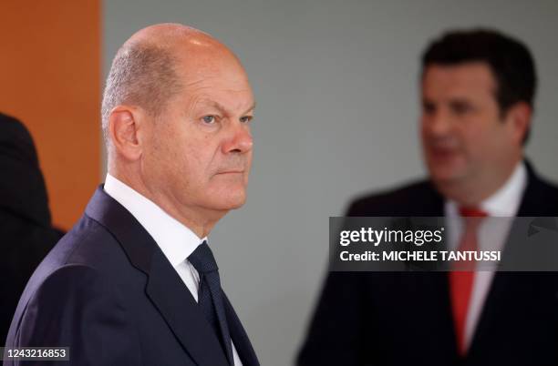 German Chancellor Olaf Scholz arrives prior to the weekly cabinet meeting as German Minister of Labour and Social Affairs Hubertus Heil is seen in...