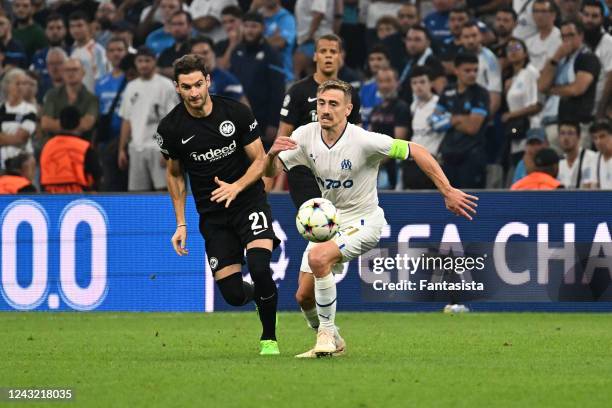 Lucas Alario of Eintracht Frankfurt in action with Valentin Rongier of Olympique Marseille during the UEFA Champions League Group D match between...