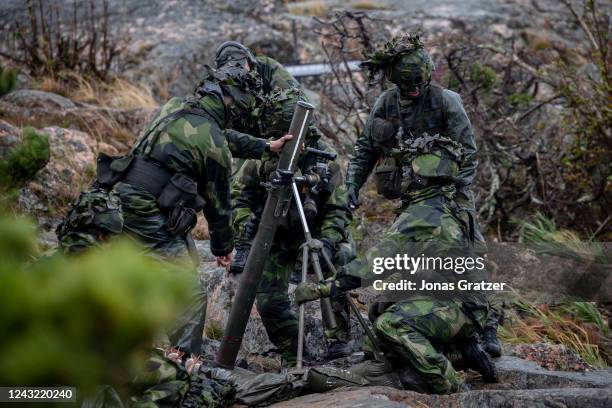 The Swedish Amphibious Regiment are loading a 81 mm grenade launcher on September 13, 2022 in Stora Skogsskar, Sweden. As part of Archipelago...
