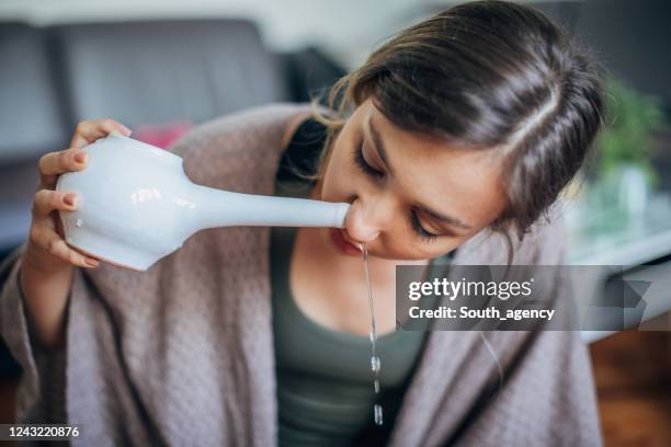 cleaning procedure for the body - human nose stock pictures, royalty-free photos & images