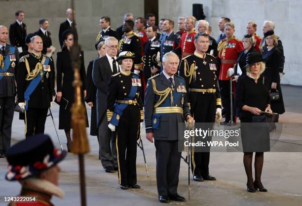 King Charles III , Camilla, Queen Consort and Princess Anne, Princess Royal take part in the procession with the coffin of Britain's Queen Elizabeth...