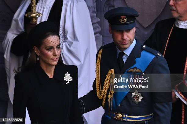 Catherine, Princess of Wales and Prince William, Prince of Wales leave after a service for the reception of Queen Elizabeth II's coffin at...
