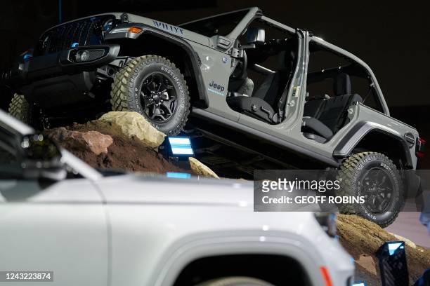 The Jeep Wrangler 4xe Willys sits on a slope following the Jeep Press conference at the 2022 North American International Auto Show in Detroit,...