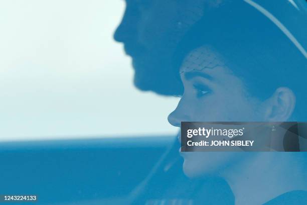 Meghan, Duchess of Sussex and Prince Harry, Duke of Sussex leave Westminster Hall, at the Palace of Westminster in London on September 14 where the...