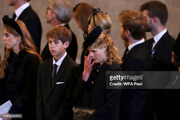 James, Viscount Severn and Lady Louise Windsor pay their respects in The Palace of Westminster during the procession for the Lying-in State of Queen...