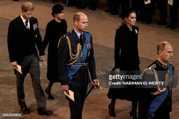 Britain's Prince Harry, Duke of Sussex, Meghan, Duchess of Sussex, Britain's Prince William, Prince of Wales, Britain's Catherine, Princess of Wales...