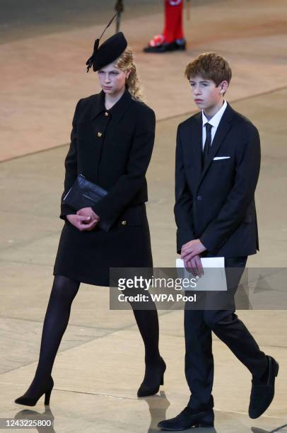 James, Viscount Severn and Lady Louise Windsor walk as procession with the coffin of Britain's Queen Elizabeth arrives at Westminster Hall from...