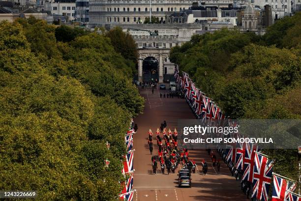 The coffin of Queen Elizabeth II, is pulled by a Gun Carriage of The King's Troop Royal Horse Artillery, during a procession from Buckingham Palace...