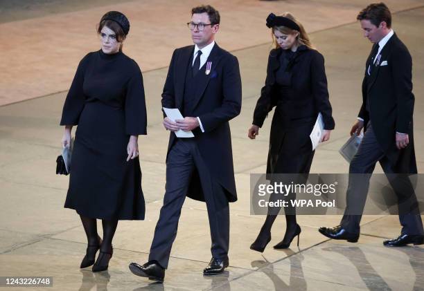 Princess Eugenie, her husband Jack Brooksbank, Princess Beatrice and husband Edoardo Mapelli Mozzi walk as procession with the coffin of Britain's...