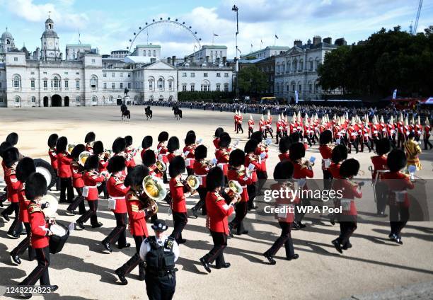 Members of the Life Guards lead The Band of the Grenadier Guards through Horseguards Parade Ground during the ceremonial procession of Queen...