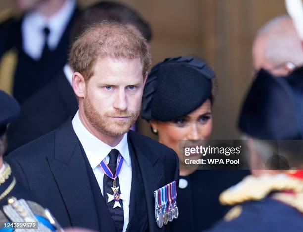 Prince Harry and Meghan, Duchess of Sussex leave Westminster Hall, London after the coffin of Queen Elizabeth II was brought to the hall to lie in...