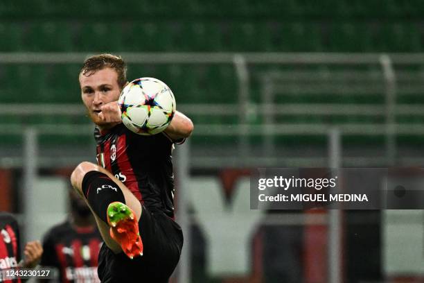 Milan's Italian midfielder Tommaso Pobega controls the ball during the UEFA Champions League Group E football match between AC Milan and Dinamo...