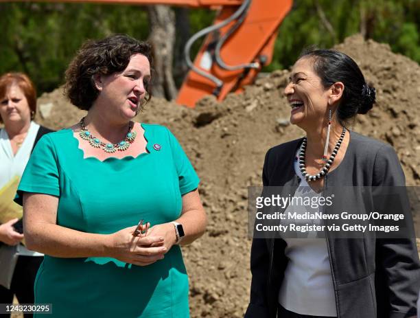 Irvine, CA Congresswoman Katie Porter , left, and U.S. Secretary of the Interior Deb Haaland chat during a tour of the Syphon Reservoir Improvement...