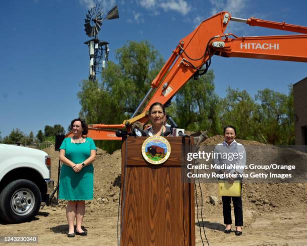 Irvine, CA U.S. Secretary of the Interior Deb Haaland, center, addresses the media as she stands with Congresswoman Katie Porter , left, and Camille...