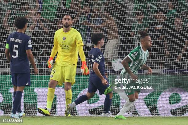 Maccabi Haifa's Surinamese midfielder Tjaronn Chery reacts after scoring the opener during the UEFA Champions League group H football match between...