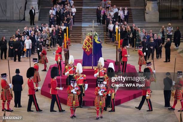 The first members of the public pay their respects as the vigil begins around the coffin of Queen Elizabeth II as it Lies in State inside Westminster...