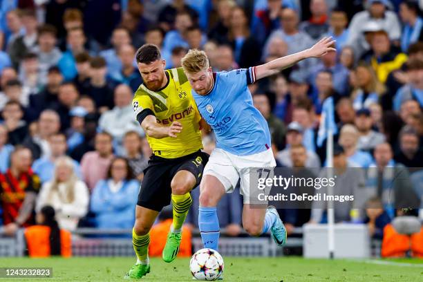 Kevin De Bruyne of Manchester City and Salih Ozcan of Borussia Dortmund Battles for the ball during the UEFA Champions League group G match between...