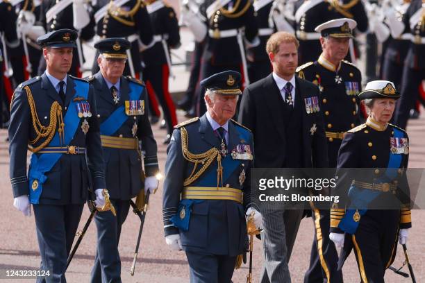 King Charles III, center, Princess Anne, Prince William and Prince Harry follow the cortege carrying the coffin of Queen Elizabeth II to Westminster...