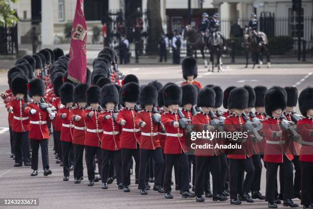 The marching band of the Grenadier Guards takes part in a ceremonial procession of the coffin of Queen Elizabeth II from Buckingham Palace to...