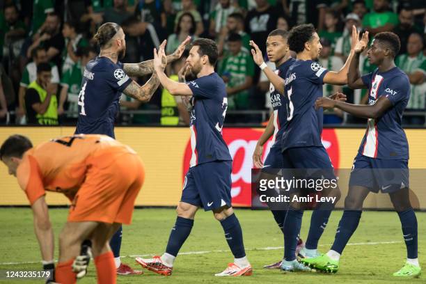Players of Paris Saint-Germain celebrate their team's third goal during the UEFA Champions League group H match between Maccabi Haifa FC and Paris...