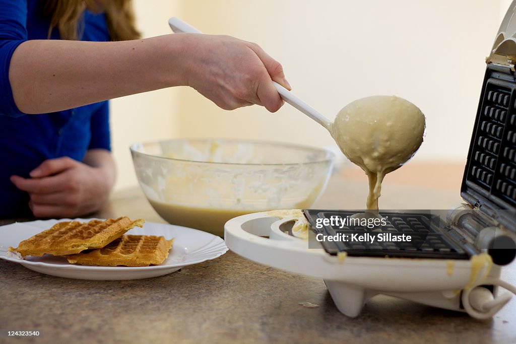 Making Belgian waffles