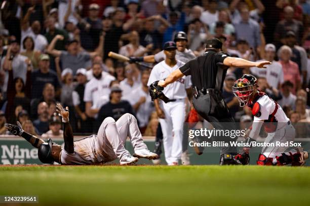 Gleyber Torres of the New York Yankees reacts as he scores after hitting an RBI double during the fifth inning of a game against the Boston Red Sox...