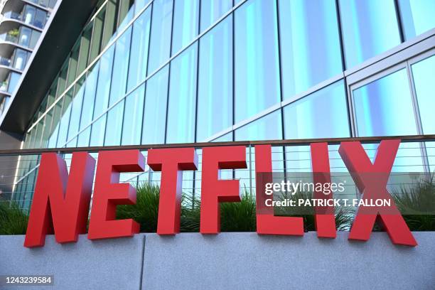 Netflix logo is seen on the side of the Netflix Tudum Theater in Los Angeles, California, on September 14, 2022.