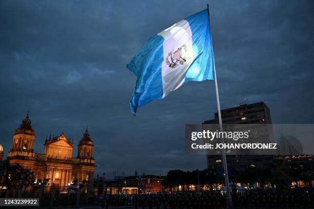 The Guatemalan flag is seen during celebrations for Guatemala's 201st anniversary of independence in Guatemala City, on September 14, 2022.