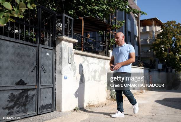 Qais Murad, 36-year-old former inmate at Sednaya prison prison on the outskirts of Damascus, walks outside his house in Gaziantep, in southeastern...