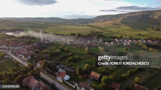 An aerial view shows the village of Viscri, where King Charles III stays when he visits the area, in Transylvania, central Romania, on September 13,...