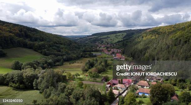 An aerial view shows the village of Valea Zalanului, where King Charles III stays when he visits the area, in Transylvania, central Romania, on...