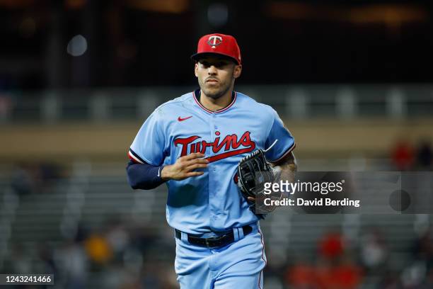 Carlos Correa of the Minnesota Twins returns to the dugout in the eighth inning during the game between the Kansas City Royals and the Minnesota...
