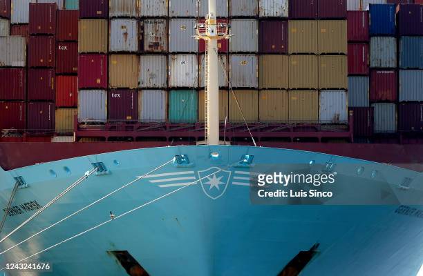 Cargo containers are stacked high aboard a ship in the Port of Los Angeles . A major railroad strike is looming that could paralyze the nation's...