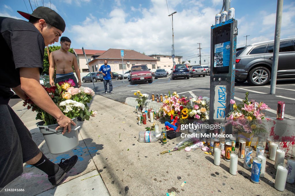 Flowers are placed at a memorial for Winfield Mikey Lee on Workman... News  Photo - Getty Images