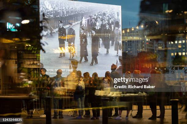 Following the death, at the age of 96, of Queen Elizabeth II, members of the public queue overnight to view the former monarch's coffin which is...