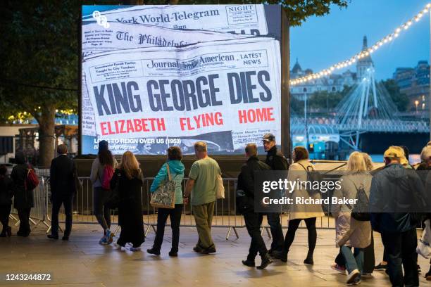 Following the death, at the age of 96, of Queen Elizabeth II, members of the public queue overnight to view the former monarch's coffin which is...