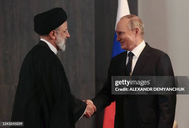 Russian President Vladimir Putin meets with his Iranian counterpart Ebrahim Raisi on the sidelines of the Shanghai Cooperation Organisation leaders'...